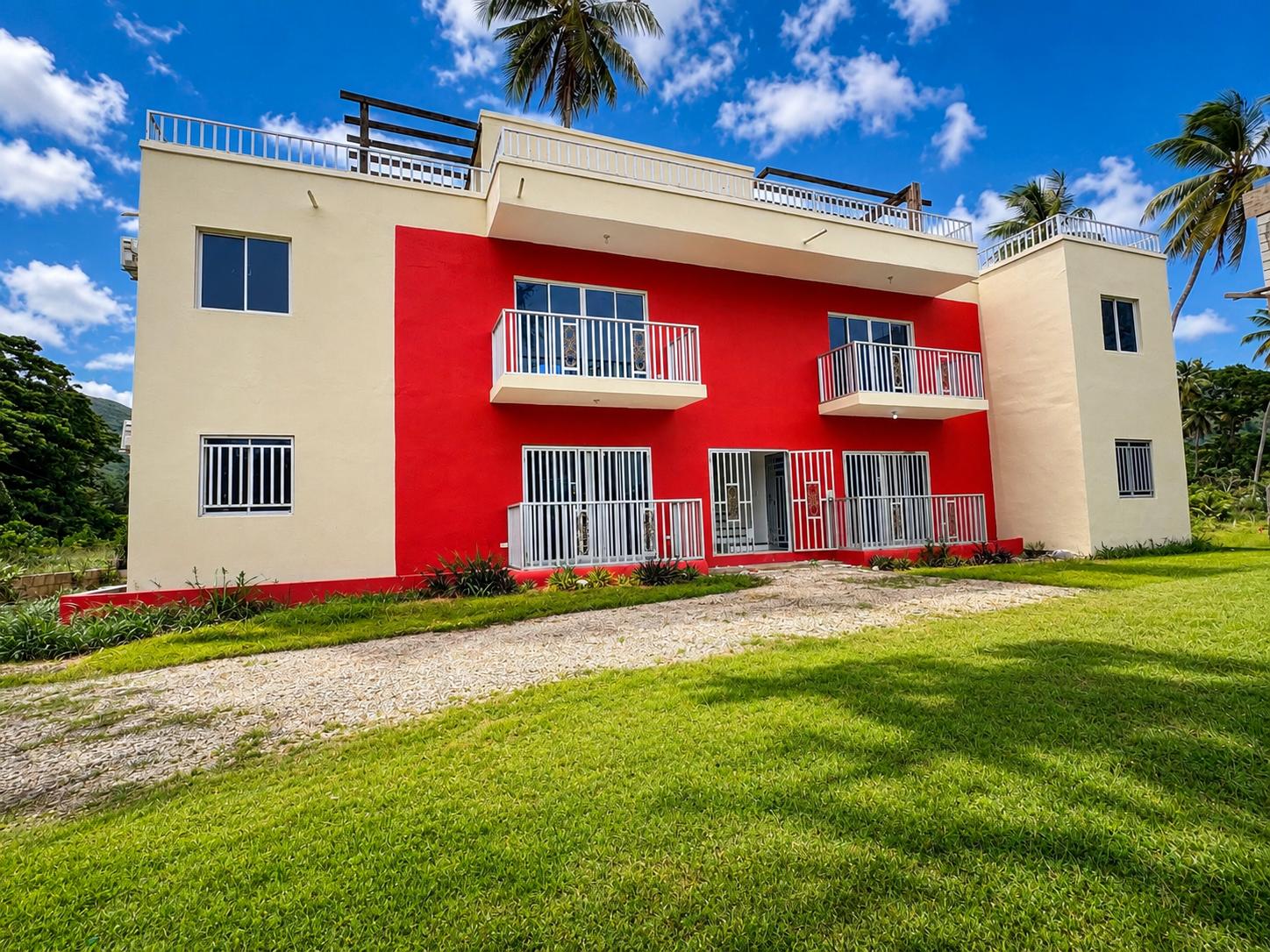 4-Apartment Building with Rooftop Terrace — Investment Opportunity